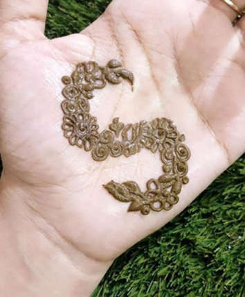 S Letter Mehndi Design On The Palm