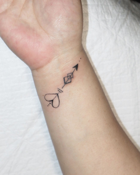 Arrow Tattoo On Wrist With A Heart