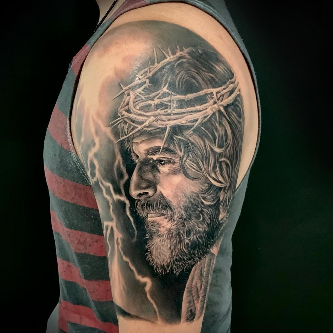 Sorrowful Jesus With Crown Of Thorns Shoulder Tattoo