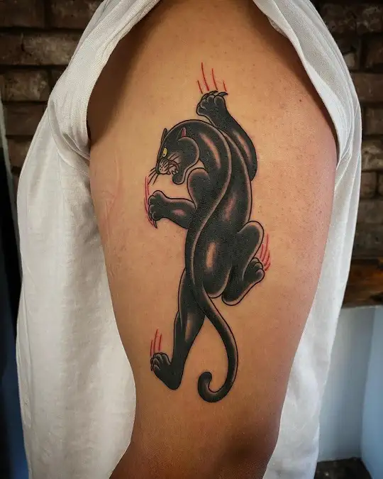 Neotraditional black panther tattoo on the forearm