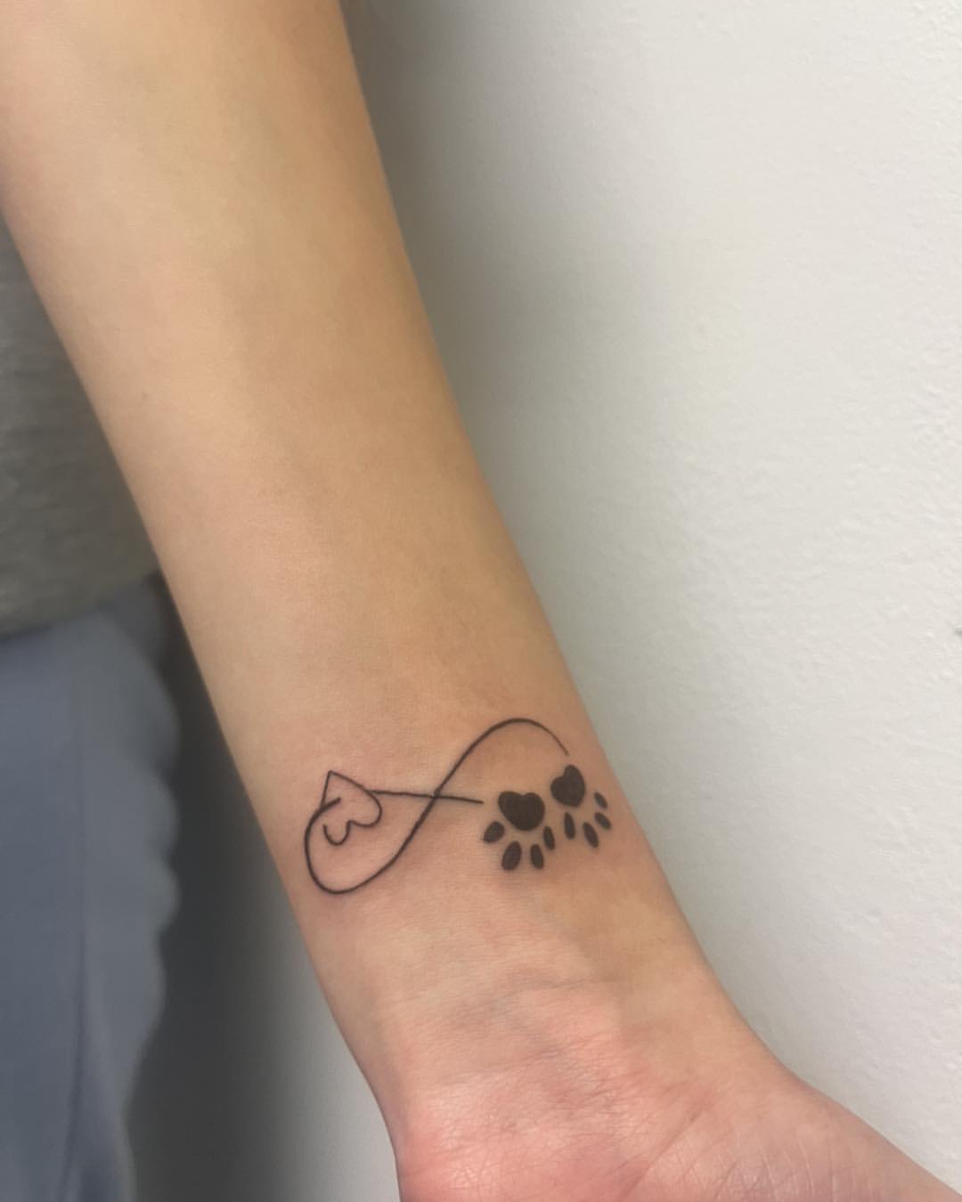 Heart And Paw Print Tattoo On Wrist