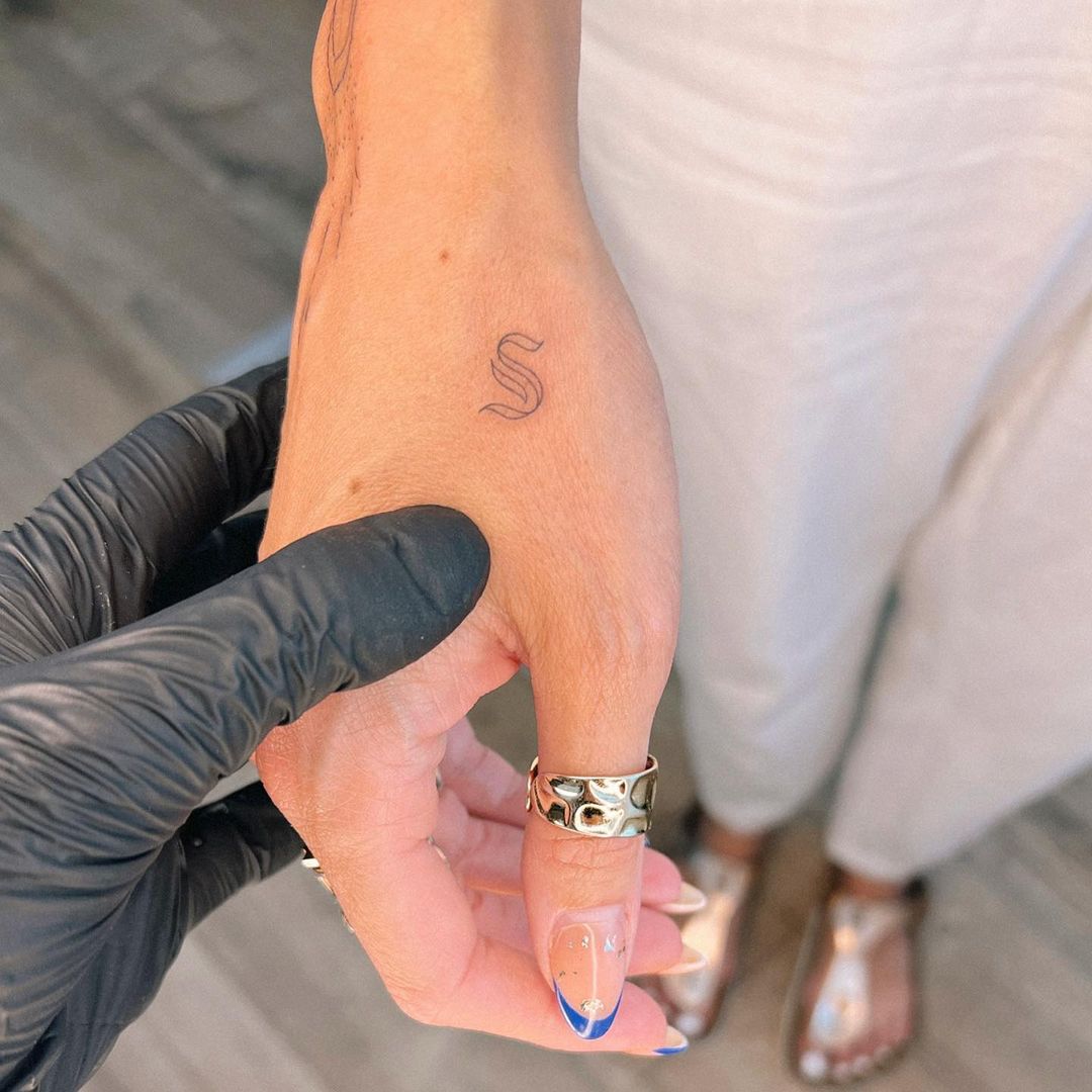 Signature Initial Tiny Meaningful Tattoo
