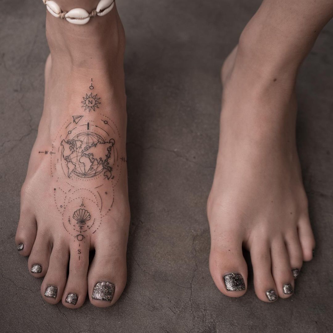 Compass Foot Tattoo With A Global Twist