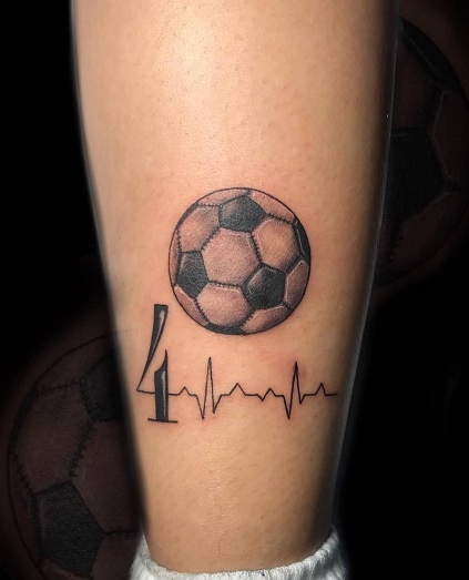 Football Tattoo Design With A Heartbeat