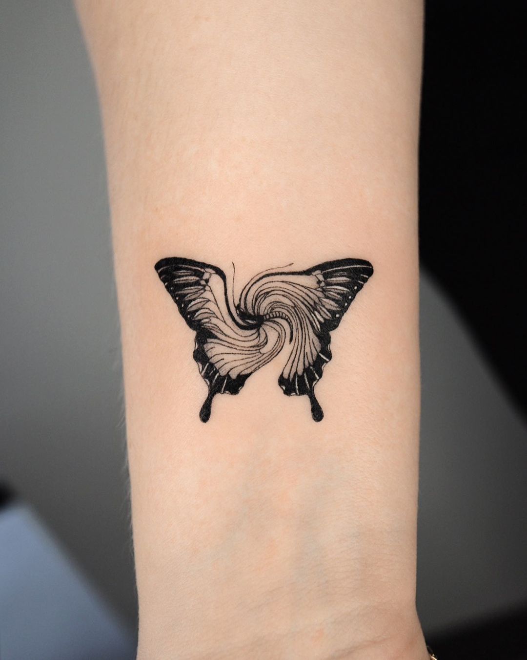 Abstract Fine Line Butterfly Tattoo On Wrist