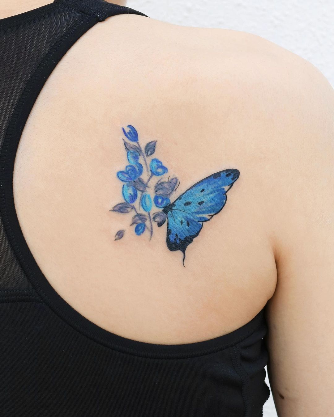 Blue Butterfly And Flowers Shoulder Tattoo