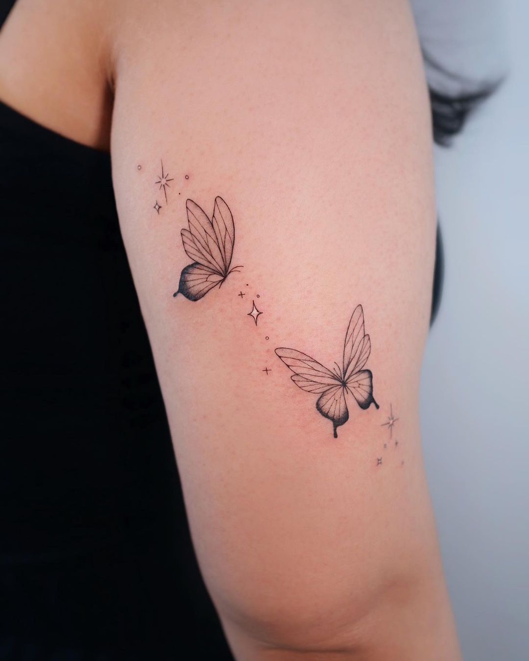 Fine Line Butterfly Tattoo On Arm For Women