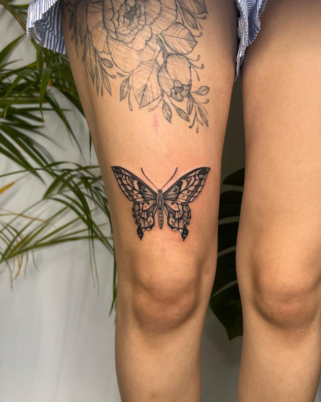 Intricate Gothic Butterfly Thigh Tattoo