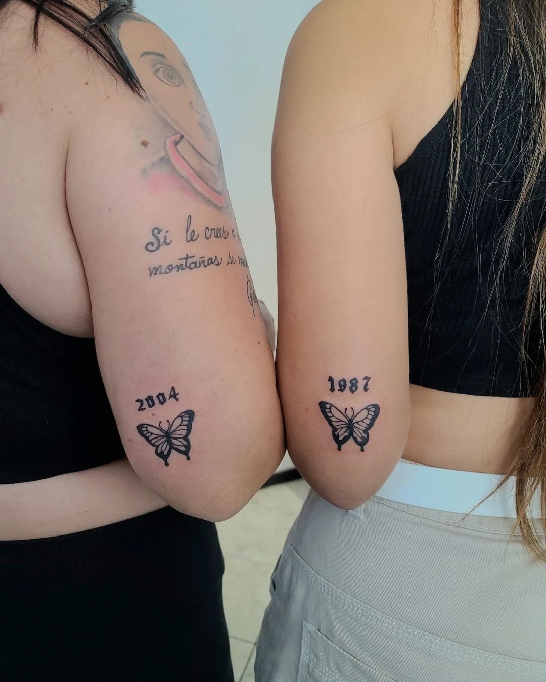 Matching Butterfly Arm Tattoos With Birth Years