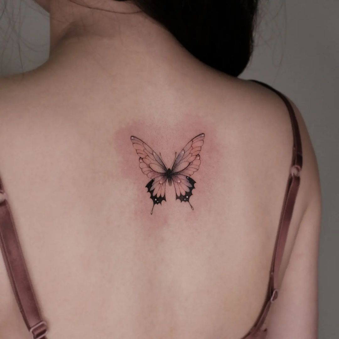 Realistic Monarch Butterfly Tattoo On Women's Back