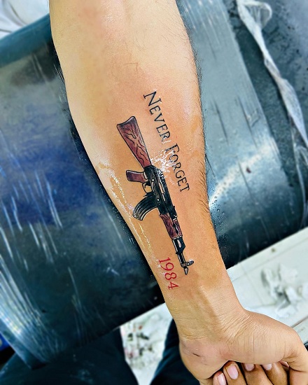 Ak 47 Tattoo On The Arm