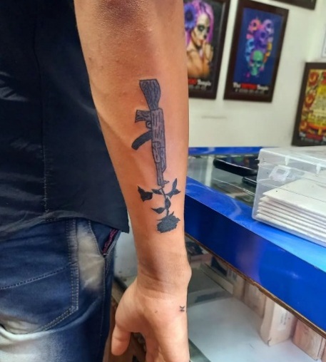 Ak 47 Tattoo With Roses