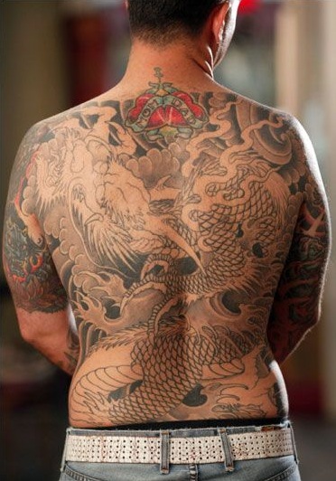Chris Nunez Tattoos On The Back