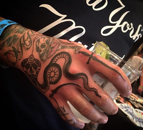 Chris Nunez Tattoos On The Right Hand