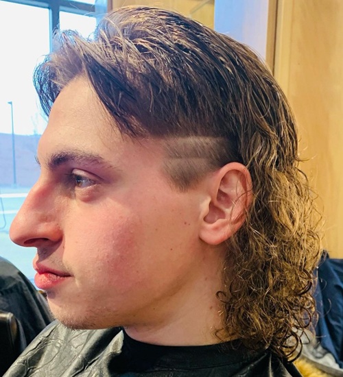 Mullet Haircut for Men with Wavy Hair
