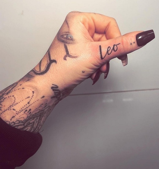 Thumb Finger Tattoo