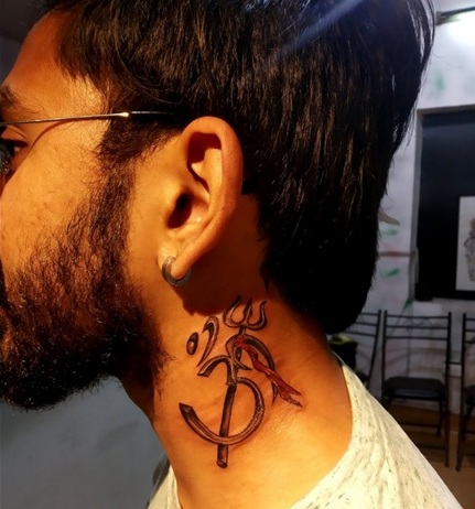 Beautiful Trishul And Damru Tattoo On The Neck