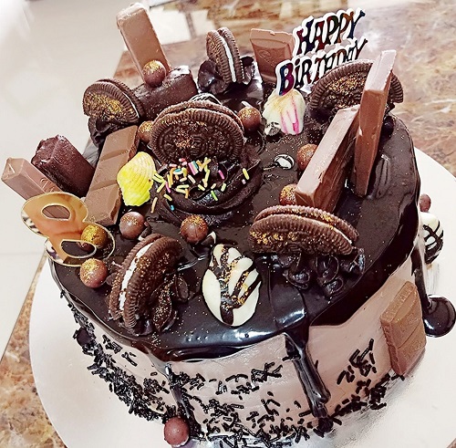 Elegant chocolate cake with a dry cherry decoration Stock Photo - Alamy