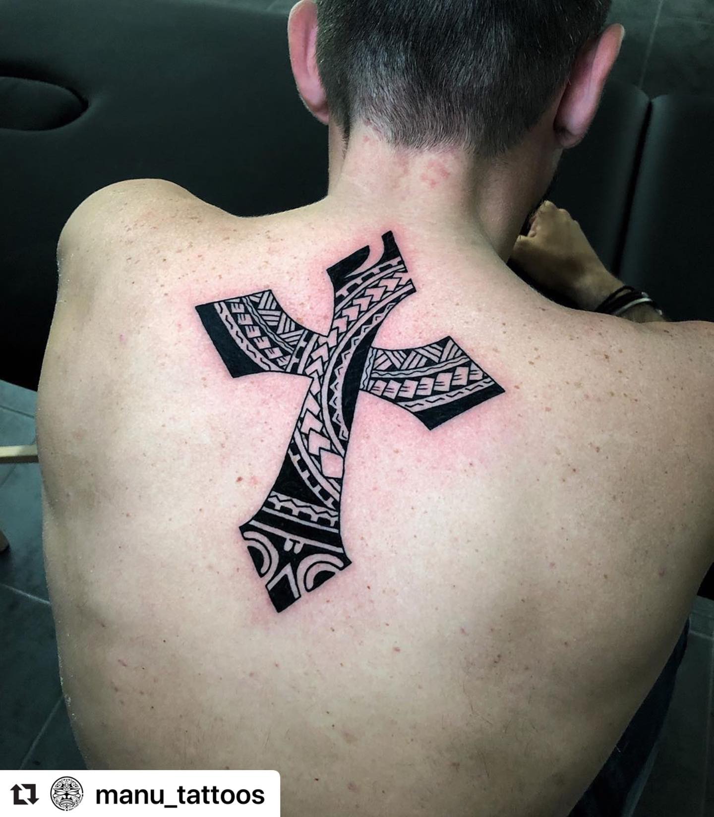 Bold Tribal Cross Back Tattoo For Men