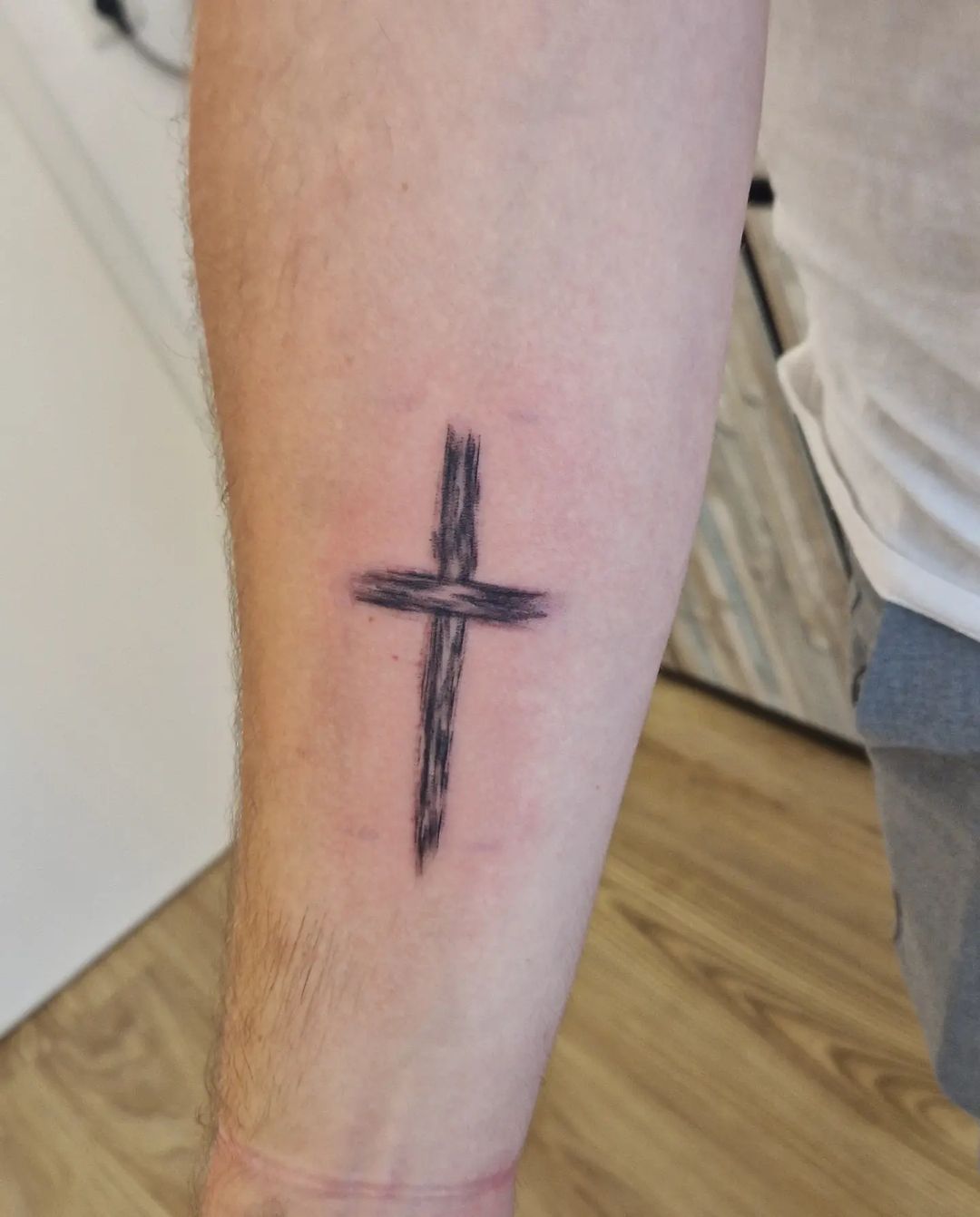 Simple Cross Tattoo On Forearm