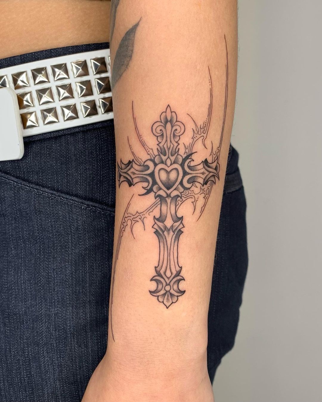 Tribal Cross Tattoo With Wings Design On Forearm For Men