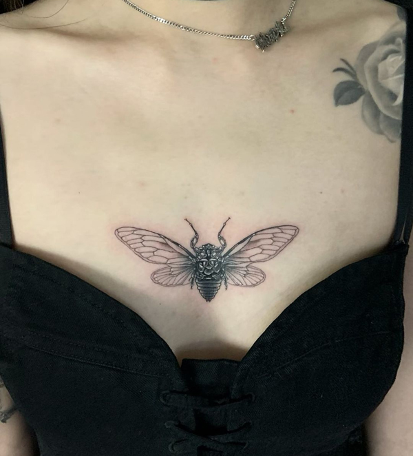 Dragonfly Sternum Tattoo