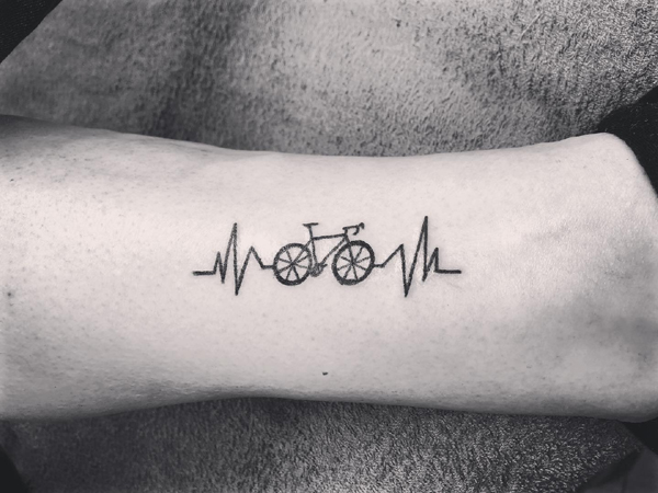 Heartbeat Tattoo On Hand With A Bicycle