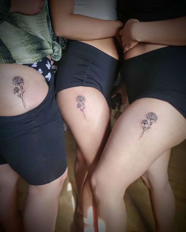 Sister Flower Tattoo On The Thigh