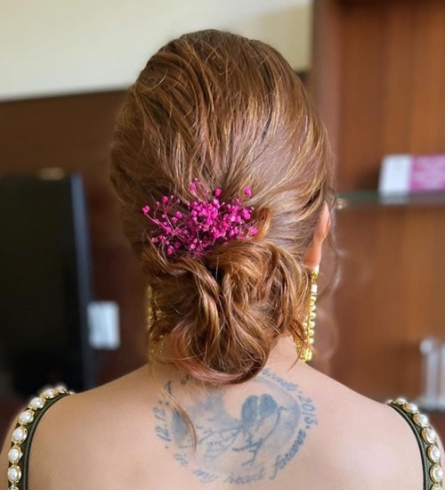 Charm Your Wedding Look By These Amazing Bun Hairstyles! | Weddingplz |  Bridal hair buns, Hair style on saree, Traditional hairstyle