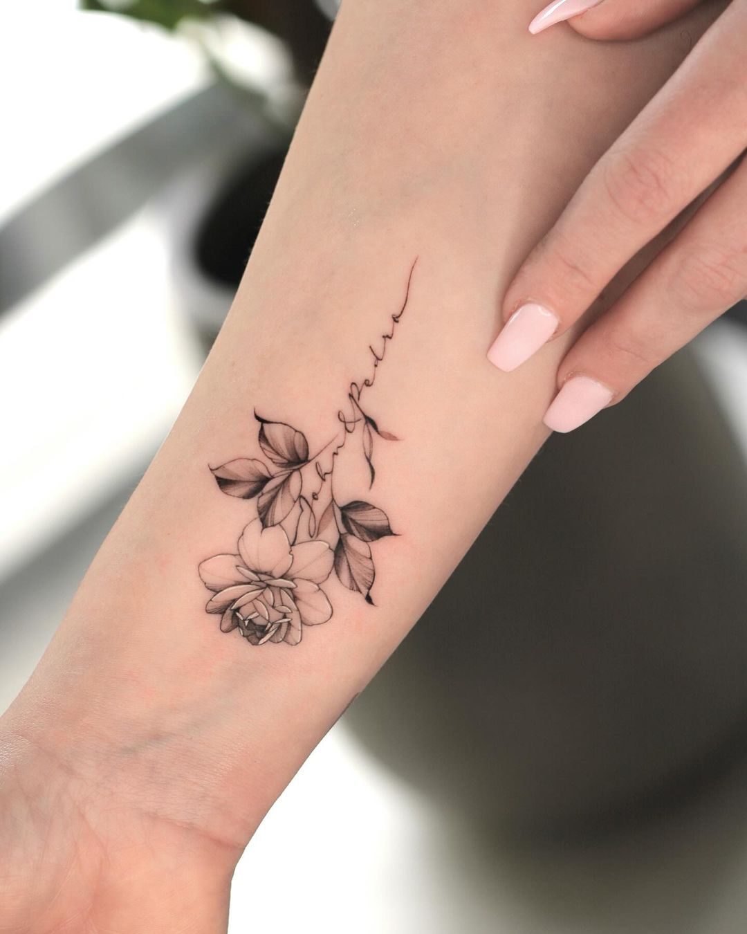 Minimalist Floral Wrist Tattoo