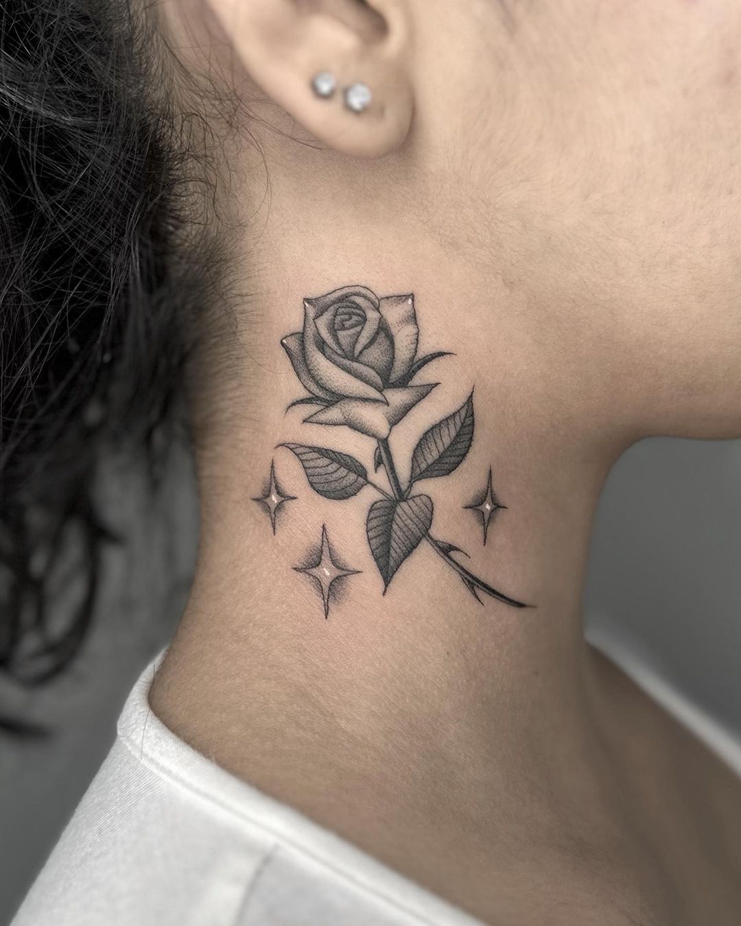 Neck Rose Tattoo With Stars