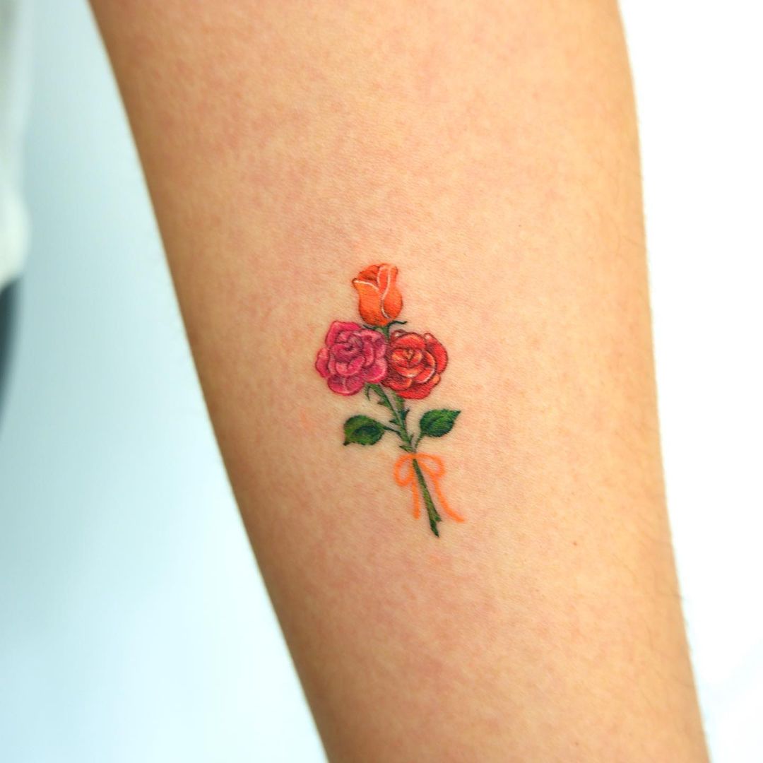 Small Rose Bouquet Tattoo On Forearm