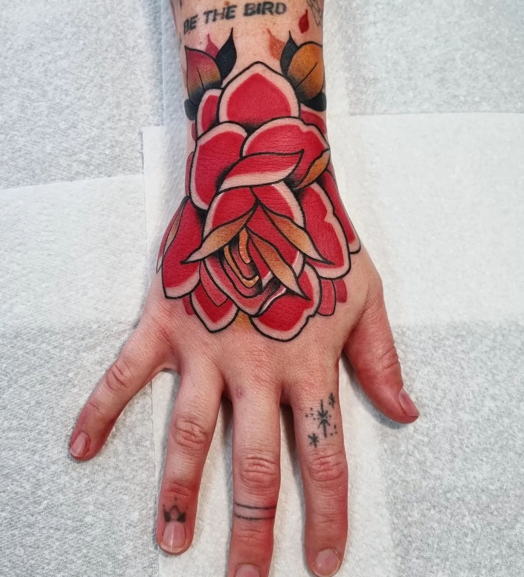 Traditional Red Rose Hand Tattoo