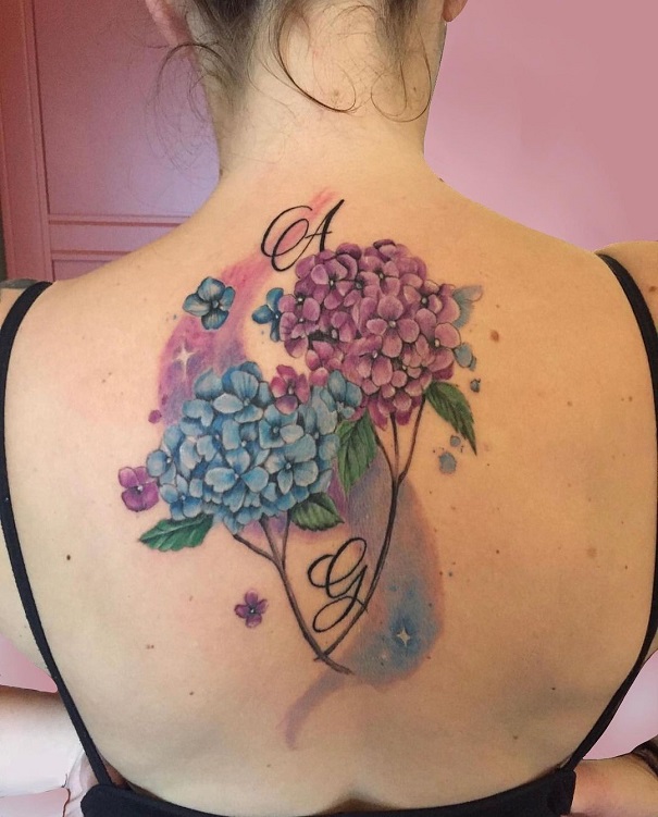 Colourful Botanical Tattoo On The Back