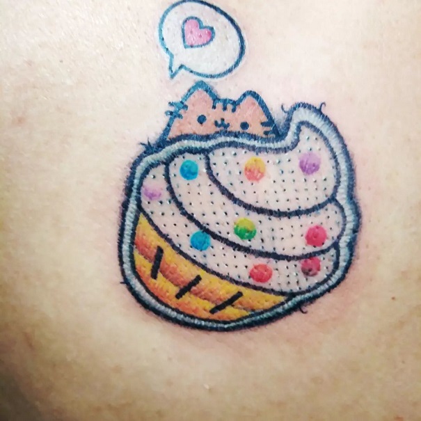 Colourful Hello Kitty Cupcake Tattoo Design