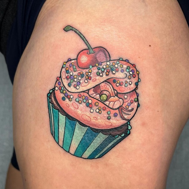 Cupcake Themed Tattoo On Thigh