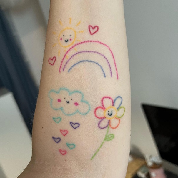 Rainbow And Flower Tattoo