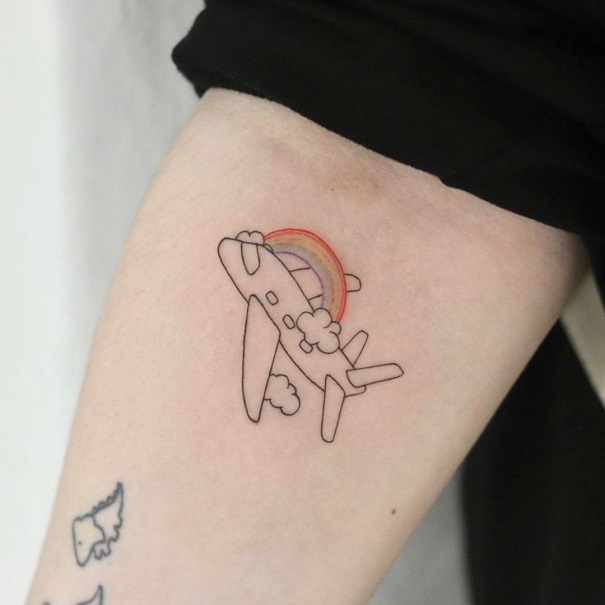 Rainbow Tattoo With An Aeroplane