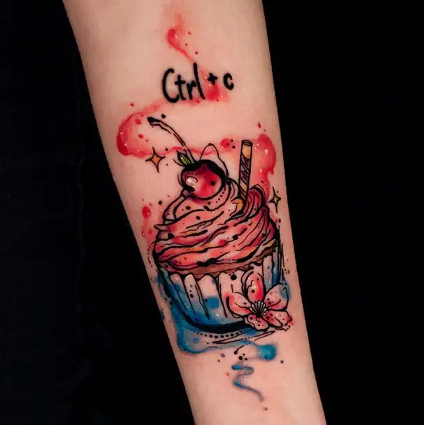 Simple cupcake tattoo with watercolours.jpg