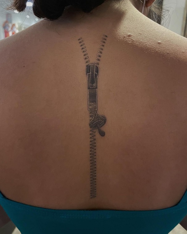 Zipper Tattoo On The Back For Females
