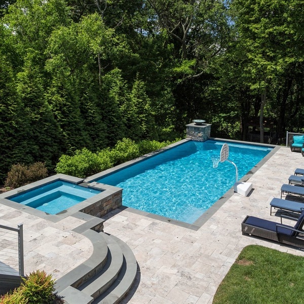 A Stylish Retreat in a Playful Rectangle Pool