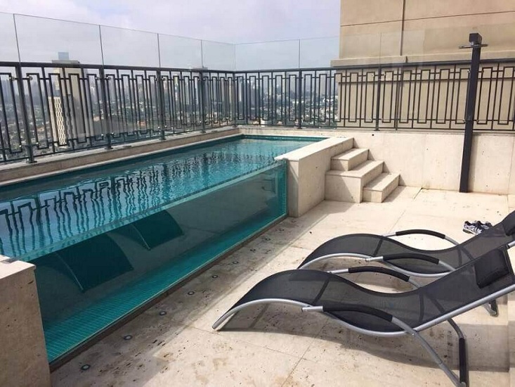 Rooftop Swimming Pool with Metal Railing