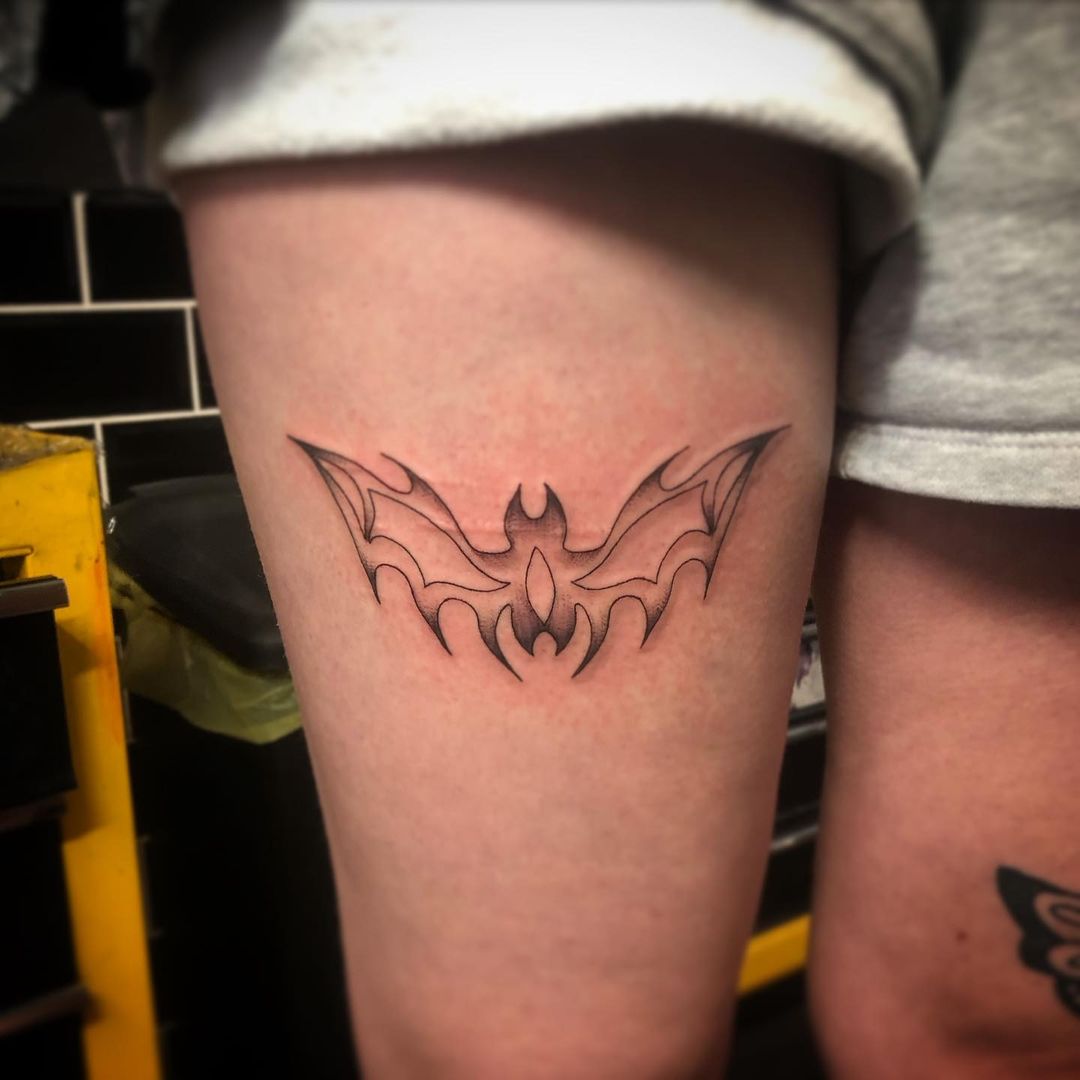 Enigmatic Bat Tribal Tattoo