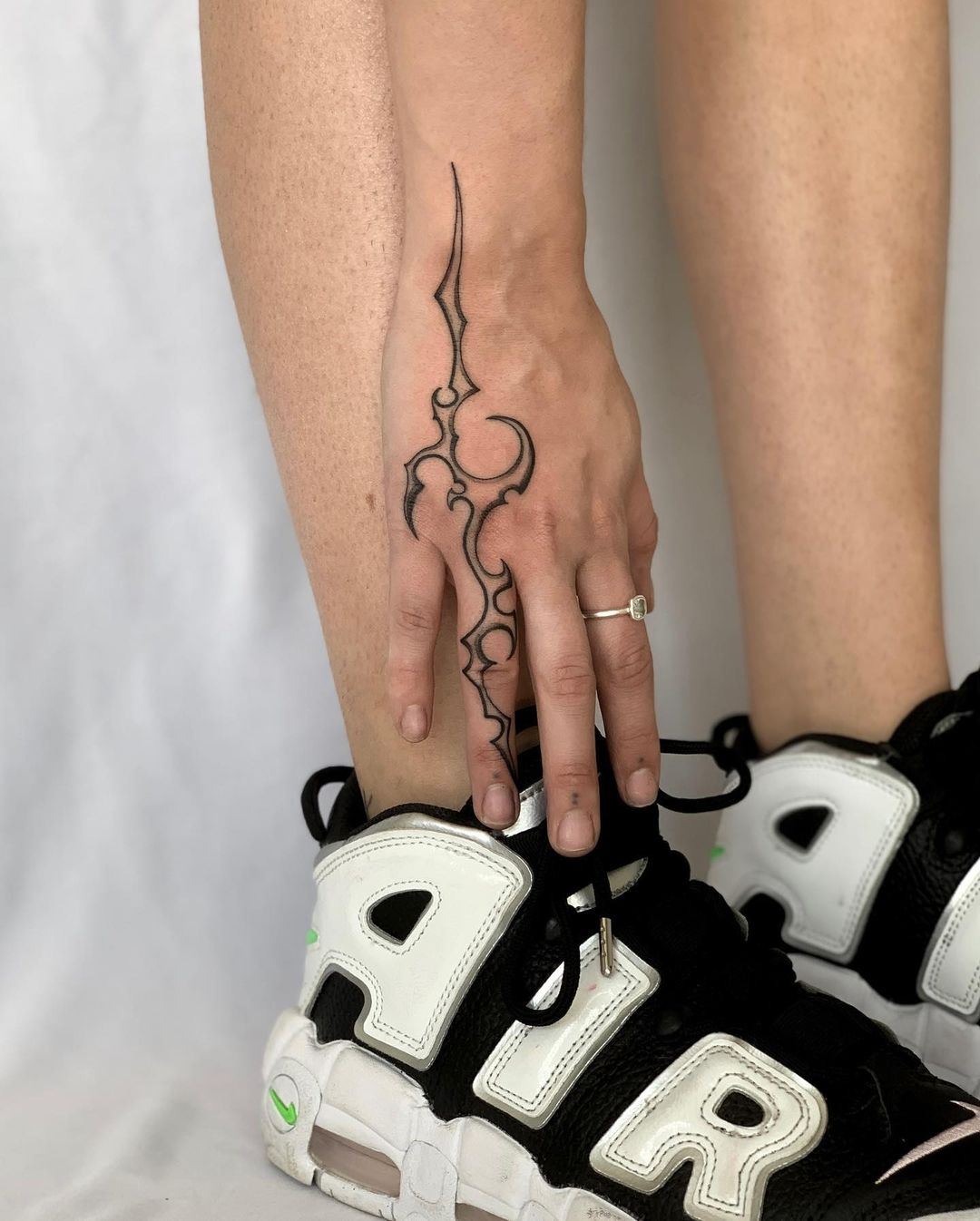 Interlocking Wrist Tribal Tattoo