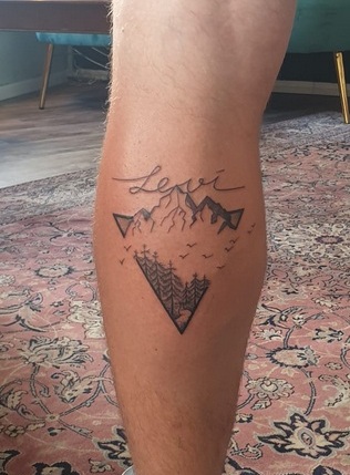 Triangle Shape Tattoo With Nature