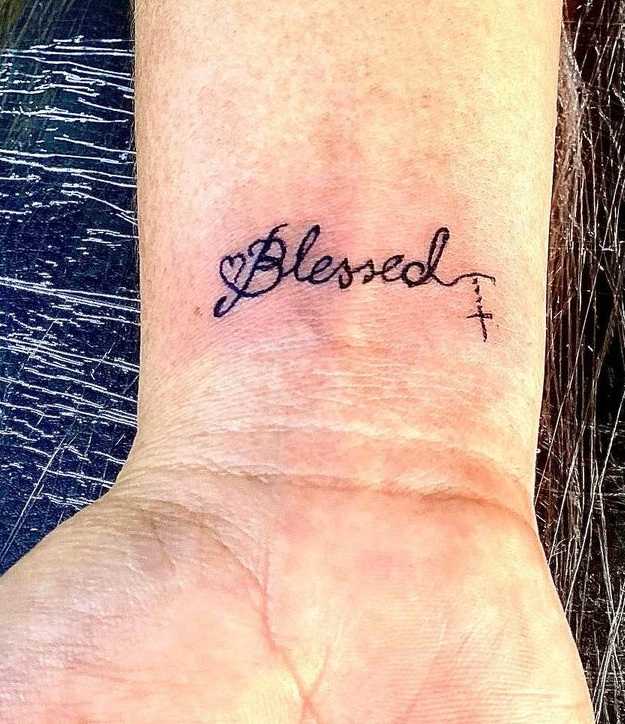 Blessed Cross Tattoo On The Wrist