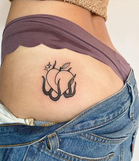 Burning Heart Butt Tattoo