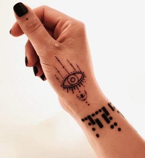 Gorgeous Evil Eye Hand Tattoo