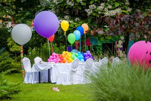 Birthday Table With Rainbow Balloons. Summer Holiday In The Park