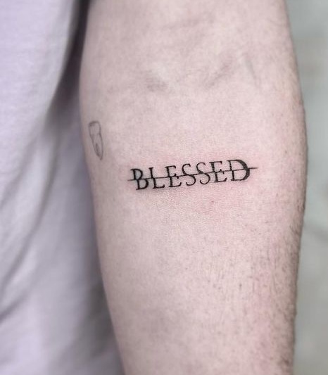 Strike Out Blessed Tattoo Design